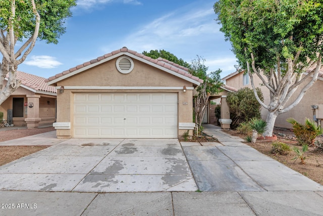 ranch-style home with a garage