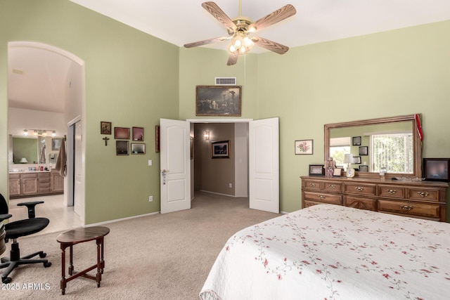 1802 W Encinas St, Gilbert, AZ 85233 - bedroom featuring a towering ceiling, light colored carpet, baseboards, ensuite bathroom, and a ceiling fan