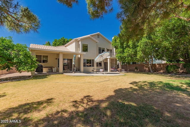 1802 W Encinas St, Gilbert, AZ 85233 - rear view of house featuring a patio, stucco siding, a balcony, and a tiled roof