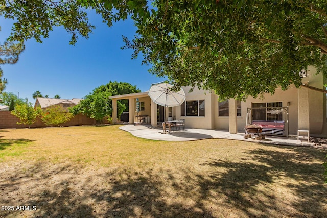 1802 W Encinas St, Gilbert, AZ 85233 - back of property with stucco siding and a patio area