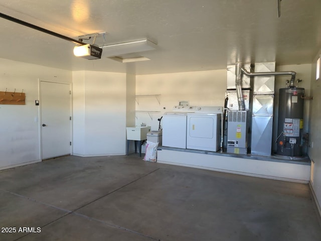 garage featuring washing machine and dryer, water heater, a garage door opener, heating unit, and a sink