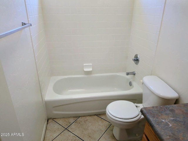 full bathroom with shower / bathing tub combination, toilet, vanity, and tile patterned flooring