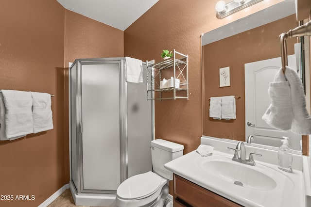 14430 W Windsor Ave, Goodyear, AZ 85395 - full bath with a textured wall, a stall shower, vanity, toilet, and vaulted ceiling