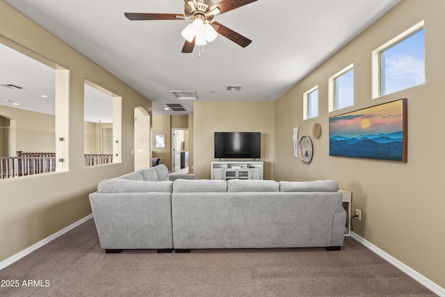 14430 W Windsor Ave, Goodyear, AZ 85395 - carpeted living room with a ceiling fan and baseboards