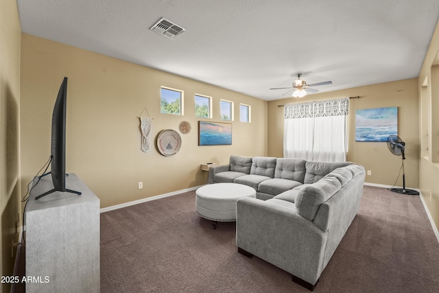 14430 W Windsor Ave, Goodyear, AZ 85395 - living room featuring carpet, ceiling fan, and baseboards