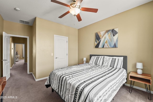 14430 W Windsor Ave, Goodyear, AZ 85395 - bedroom with carpet flooring, baseboards, and a ceiling fan