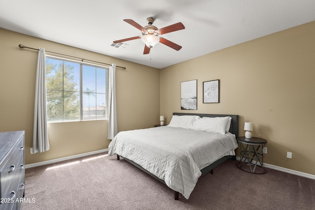 14430 W Windsor Ave, Goodyear, AZ 85395 - bedroom with baseboards, carpet floors, and a ceiling fan