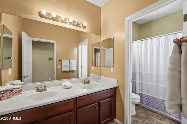 14430 W Windsor Ave, Goodyear, AZ 85395 - bathroom featuring toilet, tile patterned floors, and double vanity