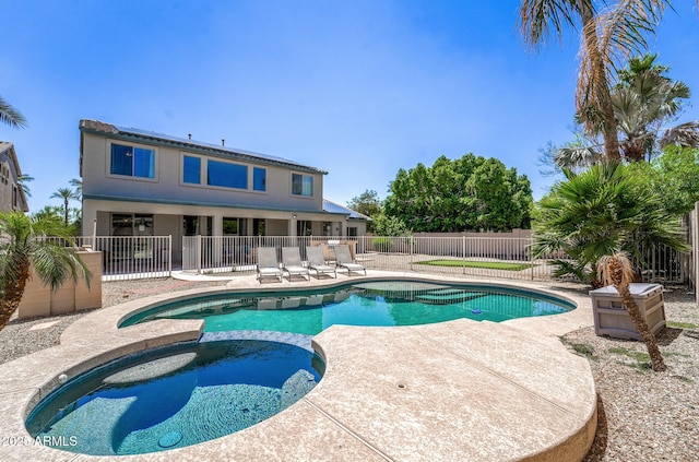 14430 W Windsor Ave, Goodyear, AZ 85395 - view of pool featuring a patio, a pool with connected hot tub, and a fenced backyard
