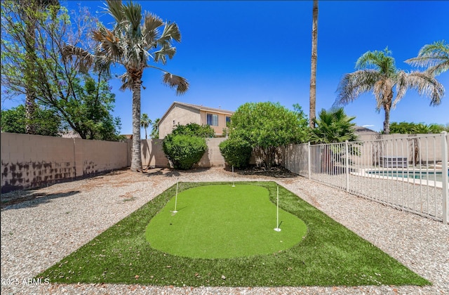 14430 W Windsor Ave, Goodyear, AZ 85395 - fenced backyard with an area to practice putting