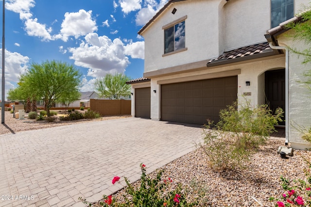 view of home's exterior with a garage