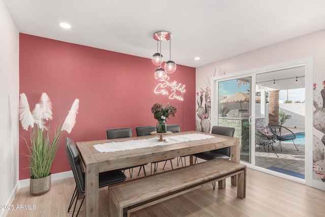 dining room with light hardwood / wood-style floors