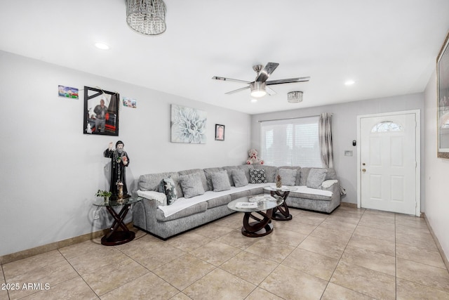 living room featuring recessed lighting, a ceiling fan, baseboards, and light tile patterned floors