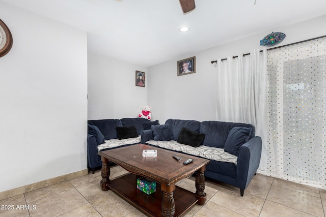 living room with recessed lighting, baseboards, ceiling fan, and light tile patterned flooring
