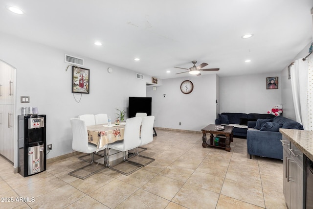 living area featuring light tile patterned floors, ceiling fan, recessed lighting, and visible vents