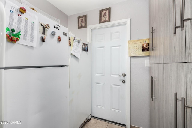 entryway featuring light tile patterned flooring