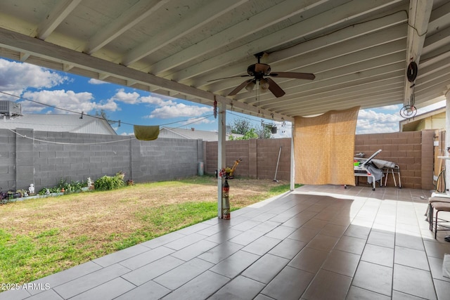 view of patio / terrace with ceiling fan and a fenced backyard