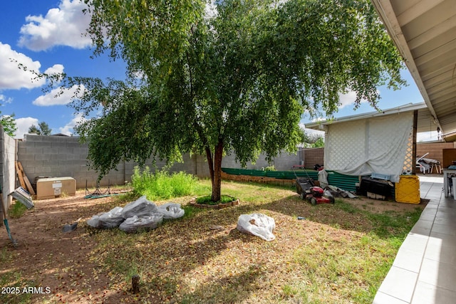 view of yard with a fenced backyard