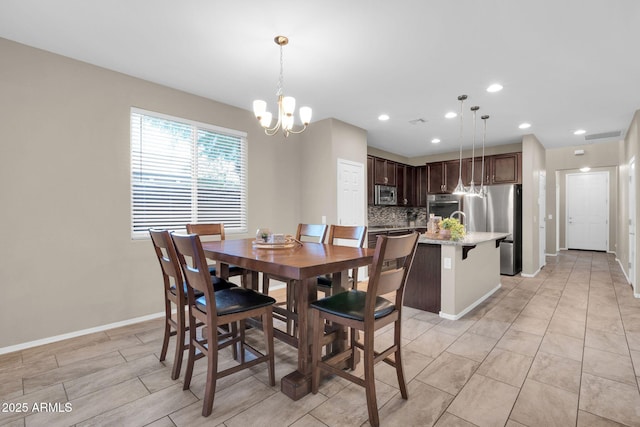 dining room with recessed lighting, visible vents, baseboards, and an inviting chandelier