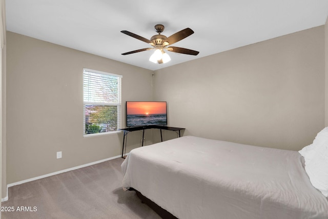 bedroom featuring a ceiling fan, baseboards, and carpet floors