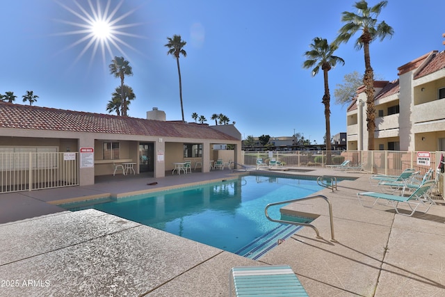 12123 W Bell Rd Unit 218, Surprise, AZ 85378 - pool featuring a patio and fence