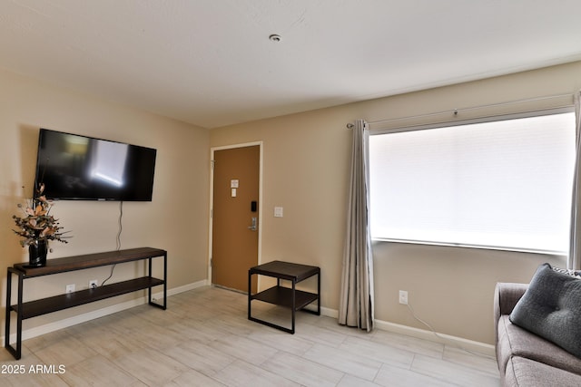 12123 W Bell Rd Unit 218, Surprise, AZ 85378 - living room featuring baseboards