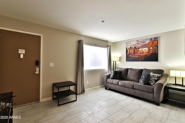 12123 W Bell Rd Unit 218, Surprise, AZ 85378 - living room featuring baseboards