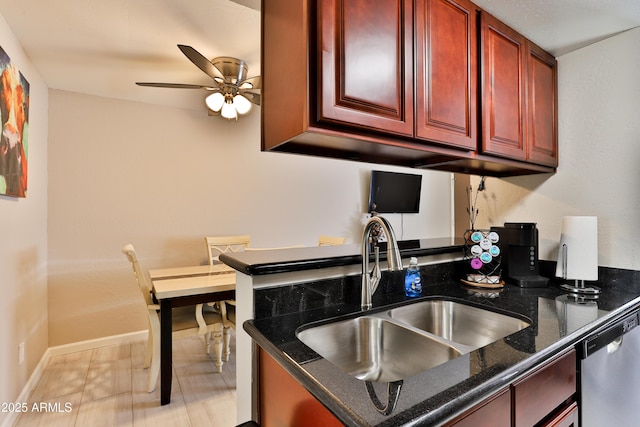 12123 W Bell Rd Unit 218, Surprise, AZ 85378 - kitchen with a ceiling fan, dark stone counters, a sink, dark brown cabinets, and dishwasher