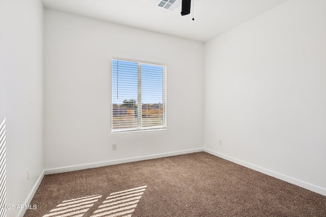 spare room featuring carpet flooring