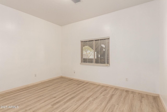 empty room featuring light wood-type flooring