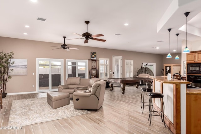 living room featuring sink