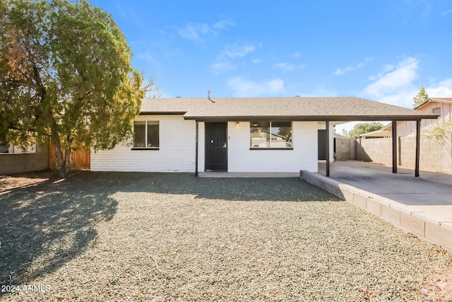 view of front of home with a patio area