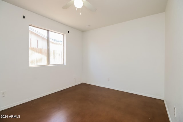 spare room with ceiling fan