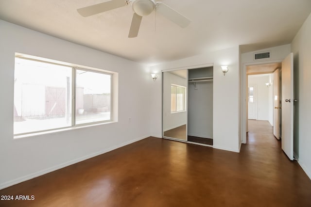 unfurnished bedroom featuring a closet and ceiling fan