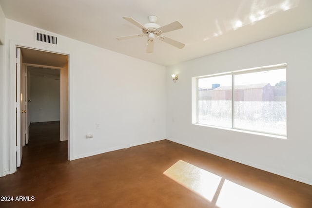 spare room with ceiling fan