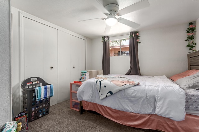 bedroom with a closet, ceiling fan, and carpet flooring