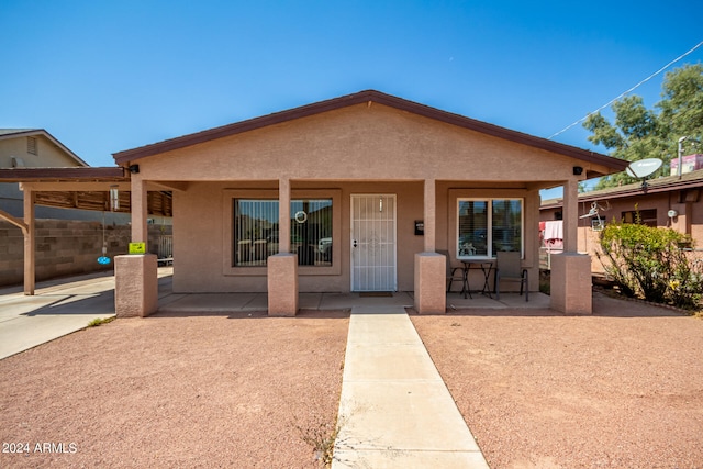 view of front of home with a patio area