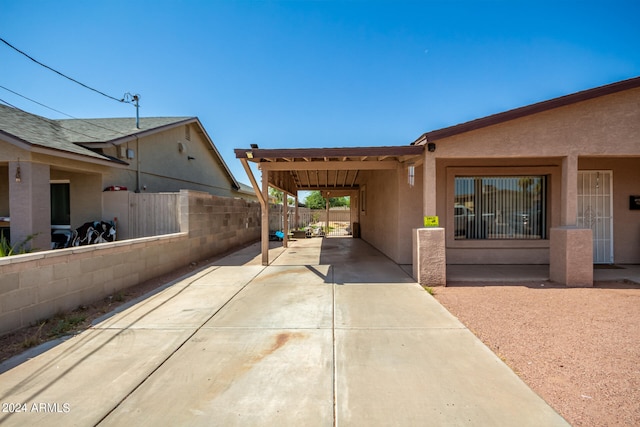 view of property exterior featuring a patio