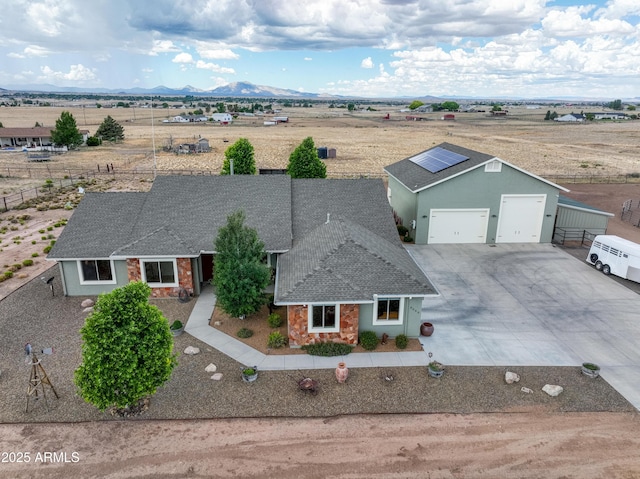 birds eye view of property featuring a mountain view