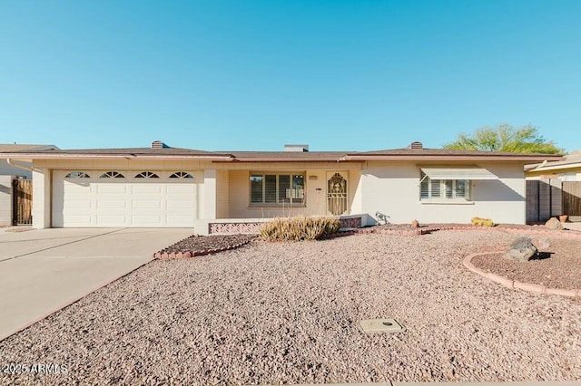 single story home with a garage