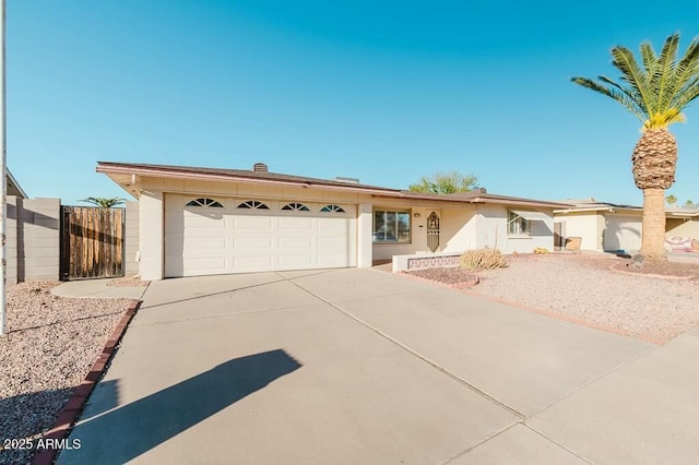 single story home with a garage