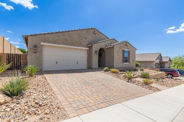 view of front of house with a garage