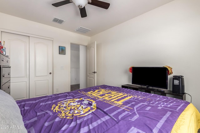 bedroom featuring visible vents, a closet, and a ceiling fan