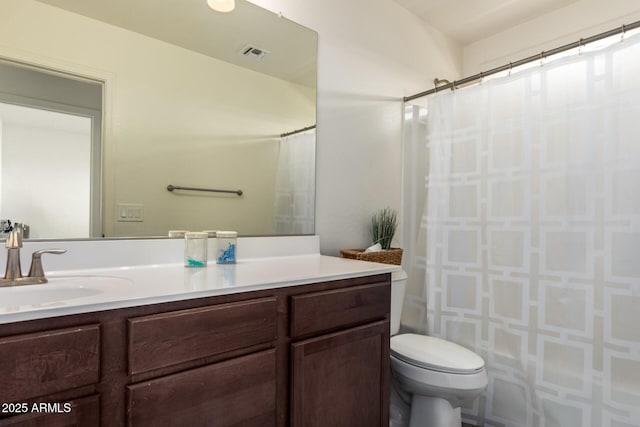 bathroom with vanity, visible vents, curtained shower, and toilet