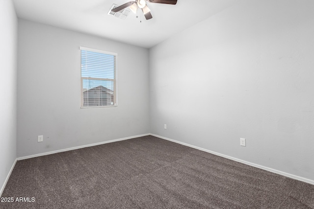 11505 W Boca Raton Rd, El Mirage, AZ 85335 - spare room featuring a ceiling fan, dark carpet, and baseboards
