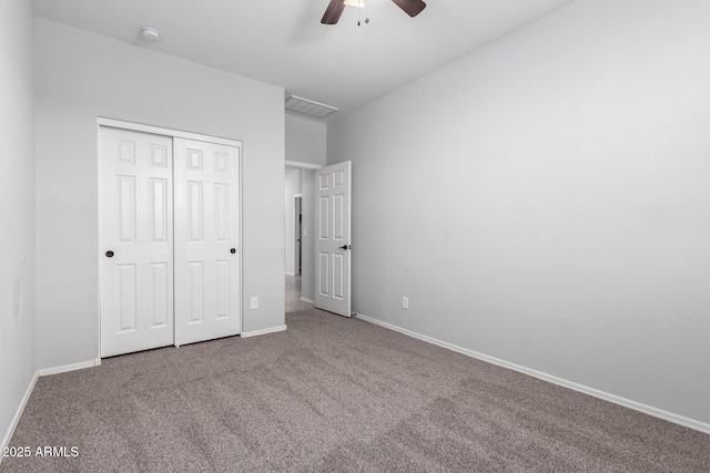 11505 W Boca Raton Rd, El Mirage, AZ 85335 - unfurnished bedroom with a closet, carpet, baseboards, and ceiling fan