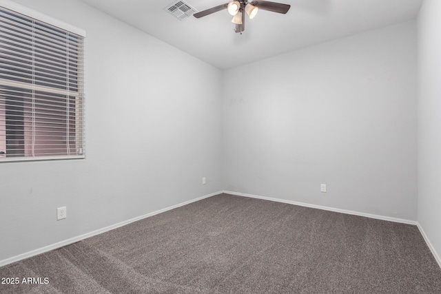 11505 W Boca Raton Rd, El Mirage, AZ 85335 - unfurnished room with ceiling fan, dark carpet, and baseboards