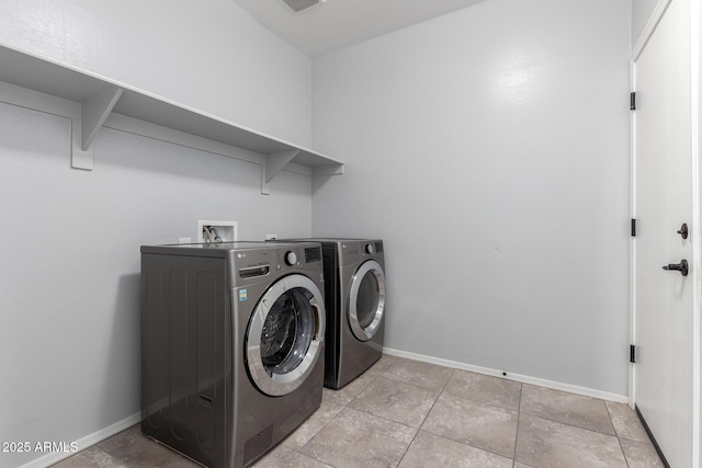 11505 W Boca Raton Rd, El Mirage, AZ 85335 - laundry room featuring washer and clothes dryer and baseboards
