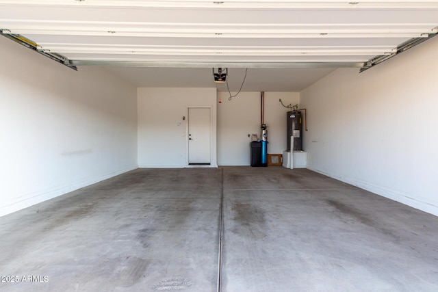 11505 W Boca Raton Rd, El Mirage, AZ 85335 - garage with water heater and a garage door opener