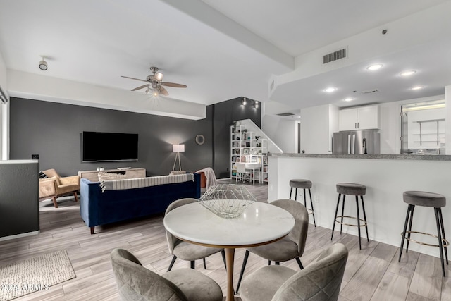 dining room with ceiling fan